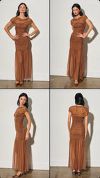 Woman wearing a brown sheer draped maxi dress with ruched detailing and mesh overlay in multiple poses against a plain wall.