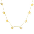 Delicate gold necklace with multiple small star-shaped charms, designed for women’s fashion and apparel.