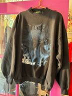 Black vintage sweatshirt with wolf graphic and embroidered bold lettering, women’s clothing style with relaxed fit.