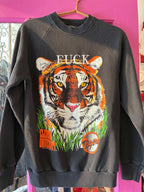 Black vintage women’s sweatshirt with a large colorful tiger graphic and bold white text on front