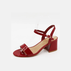 Red patent leather women's slingback mule with chunky heel and ankle strap buckle closure