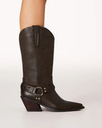 Stylish women's mid-calf boot in dark leather with decorative strap and stacked angled heel.
