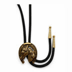 Black braided bolo tie with a bronze horse head and horseshoe design pendant for women's fashion accessories.