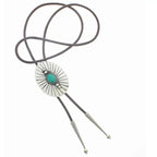 Leather bolo tie with silver decorative slide featuring a turquoise stone, stylish women's fashion accessory.