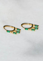 Gold vermeil earrings with dangling rectangular green gemstones, stylish accessory for women's everyday wear
