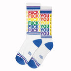White socks with blue toe and heel featuring colorful bold text and smiley face patterns on the upper cuff