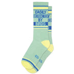 Light green gym socks with yellow toes and blue text reading easily distracted by birds for women's apparel
