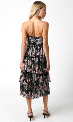 Woman wearing strapless black tiered floral midi dress from the back in women's clothing fashion style