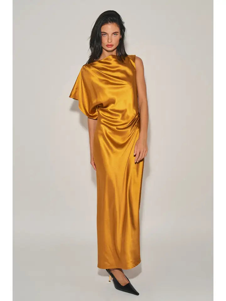 Woman wearing a mustard satin maxi dress with asymmetrical neckline, cowl drape, and single cap sleeve in women's clothing.