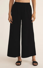 Black wide flare pants with elastic waistband made from soft cotton jersey knit women's clothing